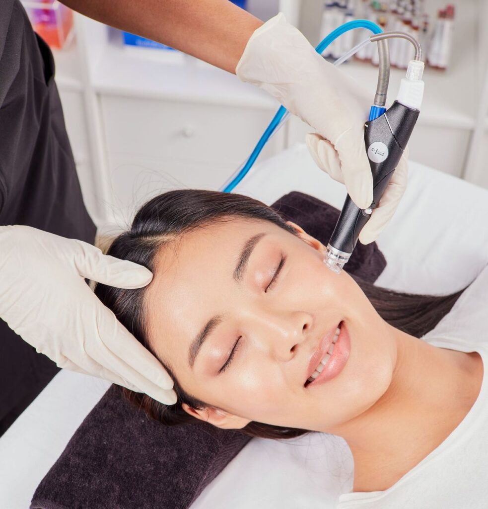 Woman receiving hydrafacial treatment